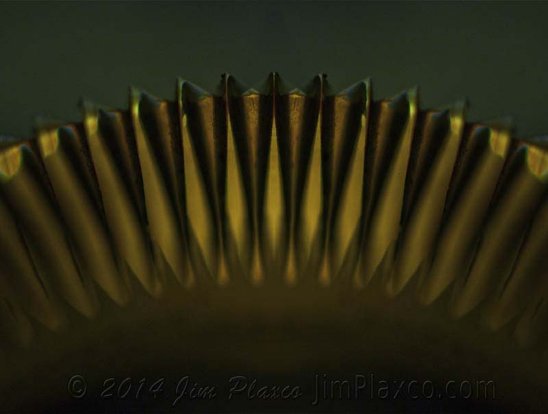 Manipulated macro photograph of a key grinder 